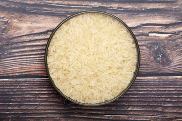 A glass bowl with white long-grain rice
