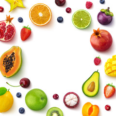 Various fruits and berries isolated on white background, top view, creative flat layout, round frame of fruits with empty space for text