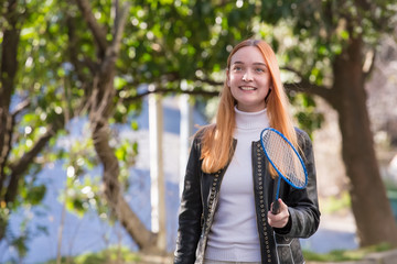 а girl and badminton