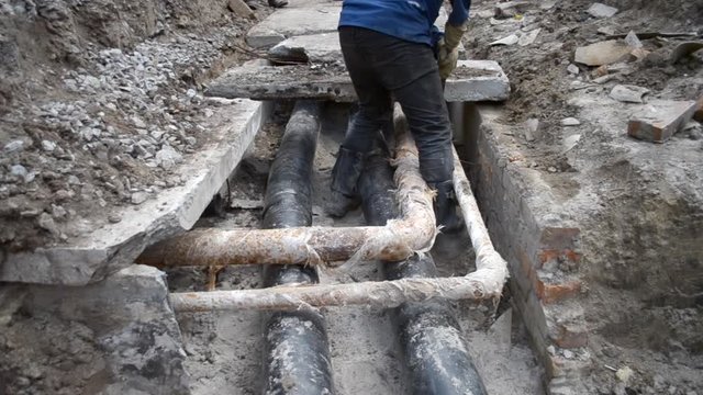 Raising concrete slabs above old water pipes