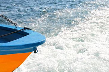 Fototapeta premium Small boat at the back of the ship