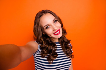 Socia media network concept. Close up photo portrait of glad positive nice careless summer free time inspired she her lady holding web cam hand taking picture traveling isolated vivid background