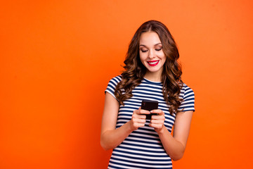 Closeup photo of nice positive satisfied cool charming pretty with vivid fashionable lips she her lady holding in hands blogging posting picture on instagram isolated background