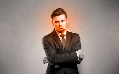 Fever businessman with burning red head concept
