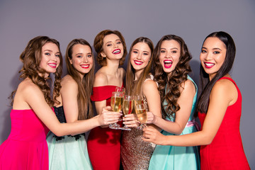 Close up side profile photo beautiful best she her ladies bonding golden sparkling wine festive social college school graduation wear fashion colorful formal-wear dresses isolated grey background