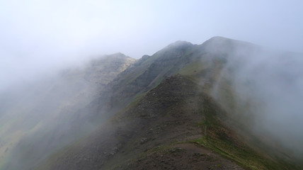 view of mountains and clouds