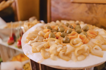 festive salty buffet, fish, meat, chips, cheese balls and other specialties for celebrating weddings and other events