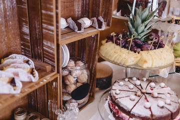 sweet festive buffet, fruit, caps, macaroni and lots of sweets