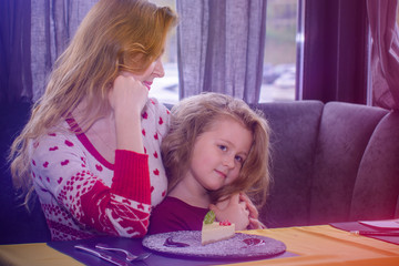 Mom with child in cozy place. Lifestyle portrait parent and kid in happiness , moments of life
