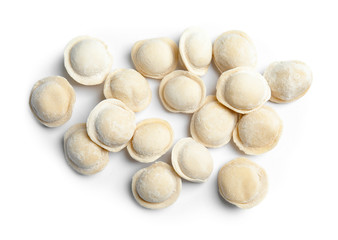 Fototapeta na wymiar Raw dumplings on white background, top view. Home cooking
