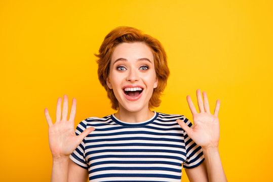 Close up photo beautiful amazing she her lady hands arms raised high-five sign symbol goodbye hi hey say wearing casual striped white blue t-shirt outfit clothes isolated yellow bright background