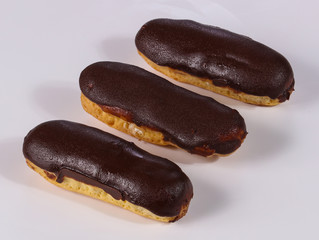 Tasty eclair with cream