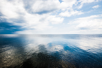 A view of the Baltic sea against cloudy blue sky, Latvia