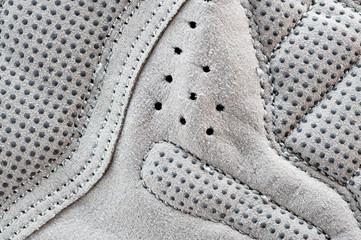 Gray protective gloves for sports and cycling close-up shot