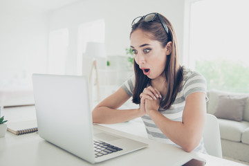 Close up photo beautiful attentive she her lady homey web lesson epic fail open mouth big eyes look screen notebook wear jeans denim striped t-shirt sit comfort chair house bright living room indoors