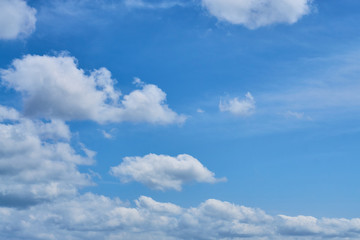 Fototapeta na wymiar Clouds on a blue sky sunny day