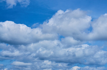 Naklejka na ściany i meble Clouds on a blue sky sunny day