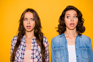 Close up photo of astonished beautiful fellows fellowship impressed by incredible information novelties secret suspect wear fashionable spring denim clothing on yellow background isolated