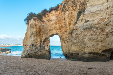 Bizarre rock formations and cliffs on the Pinhao beach at the southern Algarve near Lagos, Portugal