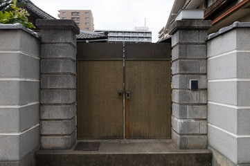 sidewalk by street wall & door
