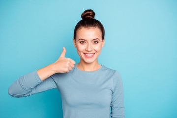 Fototapeta premium Portrait of charming candid cute millennial feel glad advise adverts information sales discounts decide choose suggest option news done pick wear spring cotton clothes isolated on blue background