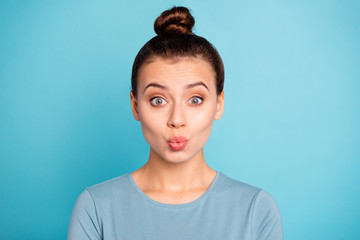 Close up photo beautiful amazing she her lady send air kiss relatives boyfriend husband duck face funky pretty attractive playful mood wear casual sweater pullover isolated blue bright background