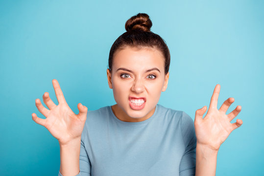 Close up photo beautiful she her lady arms hands raised showing claws violence frightening picture after watch horror film movie peekaboo wear casual sweater pullover isolated blue bright background