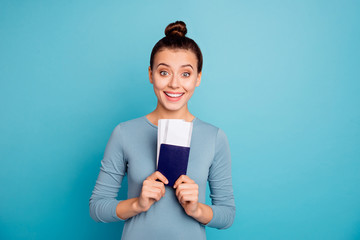 Close up photo beautiful amazing she her lady show parents friends hands arms hold paper transport tickets application first trip abroad wear casual sweater pullover isolated blue bright background