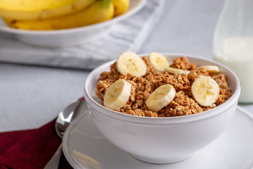Bowl of Ganola With Banana Slices