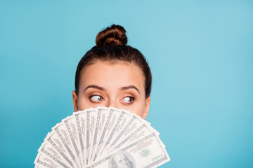 Close up photo of cute charming teen teenager hide big sum of money look have option millionaire banknote  know news minded want more wear modern spring stylish isolated on blue background