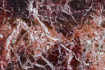 The finishing stone. The polished red marble. Texture.