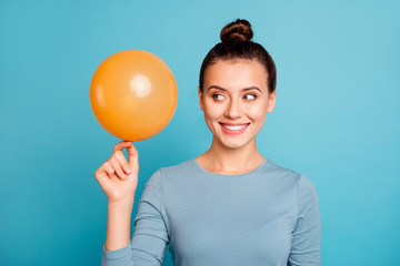 Close up photo of cunning curious lady hold hand orange ballon have idea plan think interested...