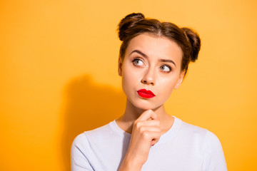 Close-up portrait of her she nice attractive lovely minded candid creative girl looking aside planning time touching chin isolated over bright vivid shine yellow background