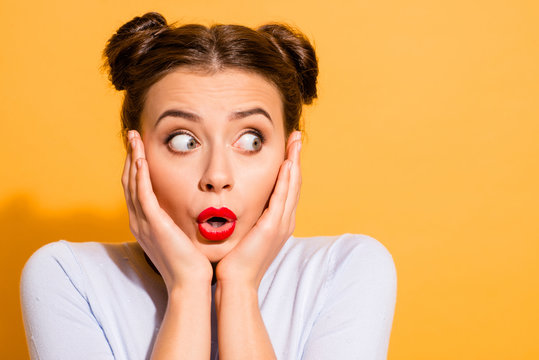 Close-up portrait of her she nice-looking attractive lovely stunned funny girl touching cheeks facial expression looking aside isolated over bright vivid shine yellow background