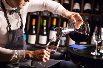 Staff training for sommelier experts. All that is needed is wine etiquette, the rules for buying wine for the customer, decanting and pouring wine into glasses.