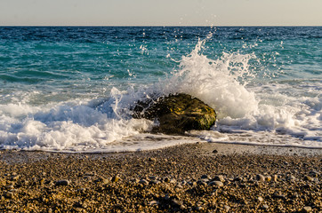 waves hitting rocks