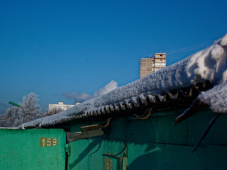 car garages in winter on a clear day