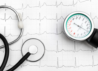 Stethoscope with manometer for measuring blood pressure on cardiogram. Top view.