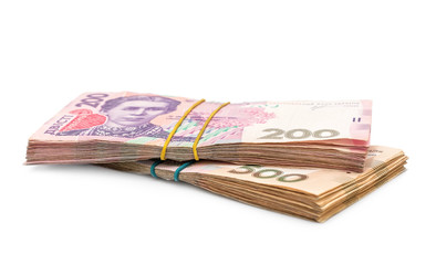 Hryvnia bundles on white background.