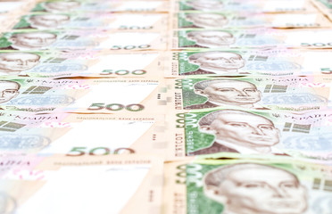 Rows of many 500 hryvnia bills. Financial background.