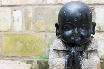 figure of a monk in china close-up