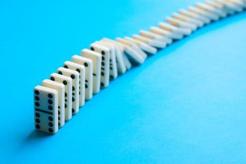 dominoes on blue background.