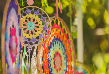 Round dream catcher..Made of wood and tissue..Beautiful ornament, purple and yellow colour.