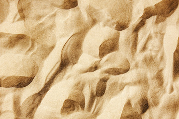 Sunny summer day beach sand pattern background.