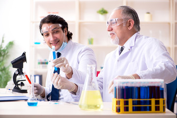 Two chemists working in the lab 