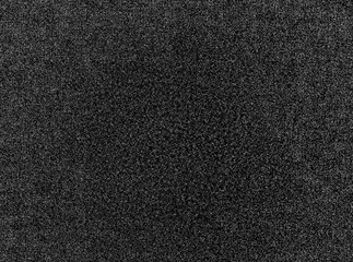 Fototapeta premium Punchy black and white tv noise texture background hd