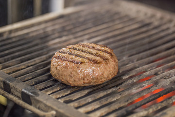 Cooking beef and pork patty for burger. Meat roasted at kitchen.