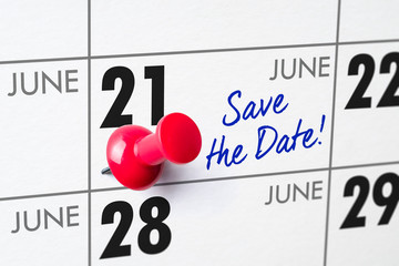 Wall calendar with a red pin - June 21