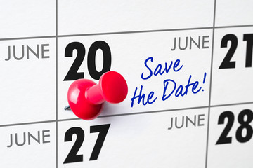 Wall calendar with a red pin - June 20