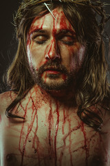 symbol, representation of the Calvary of Jesus Christ on the cross. Holy Week in Spain. man with...